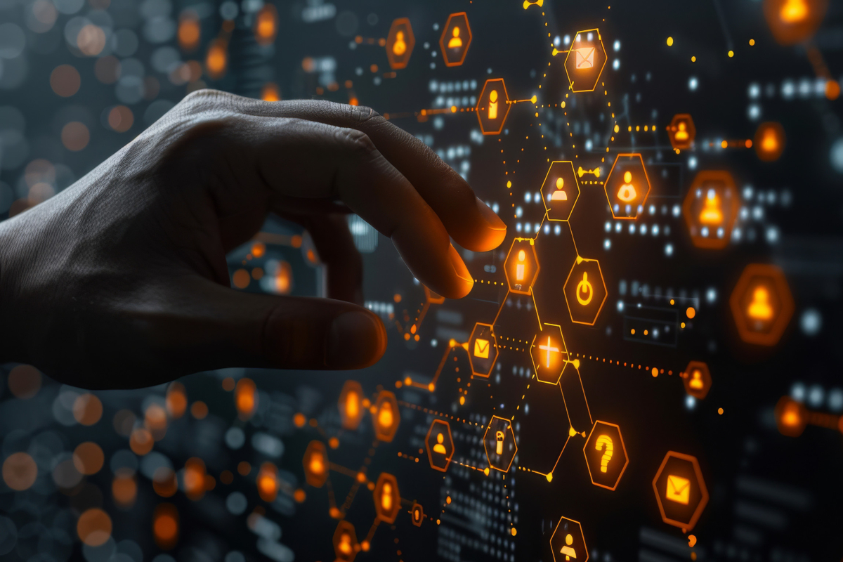 A hand reaches towards a digital interface with glowing orange hexagons. Icons include mail, power, and question marks, conveying technology interaction.
