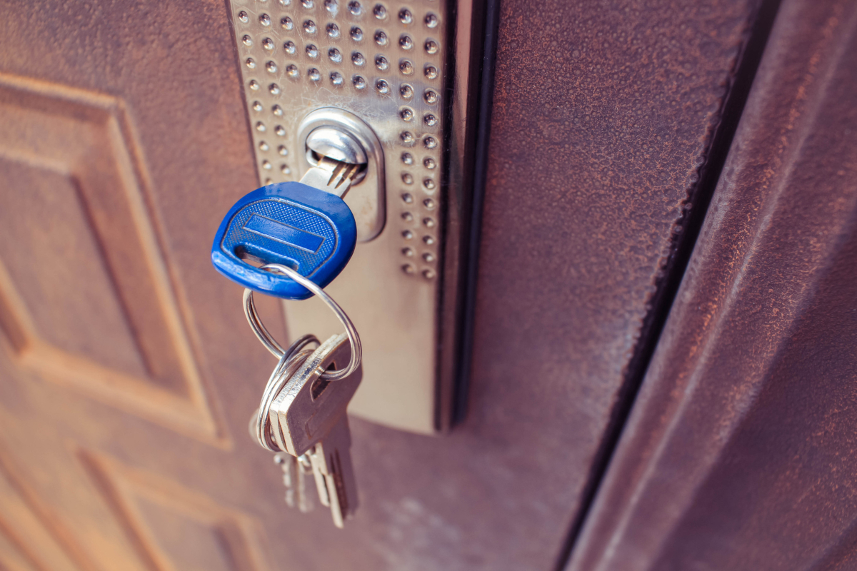 Door secured with a lock.